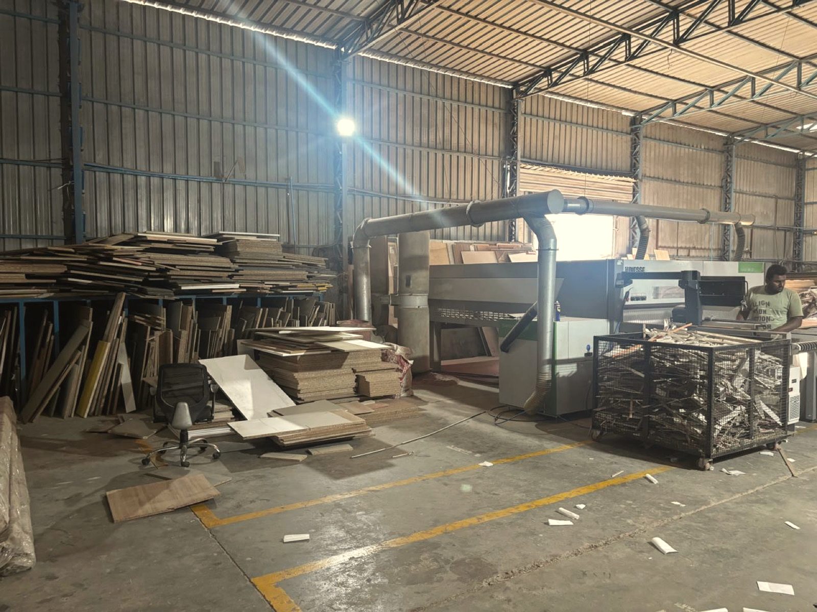 Beam saw area in the OutDo woodwork unit, with boards ready for cutting
