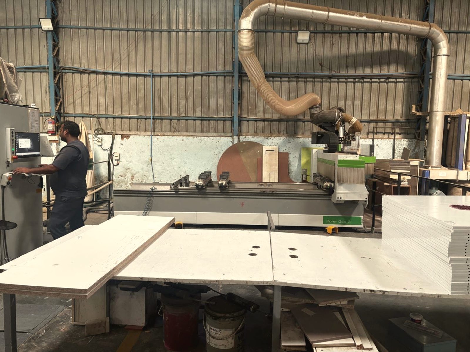 CNC machining centre with an operator in the OutDo woodwork unit